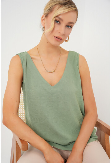 V Yaka Sıfır Kol Bluz 950